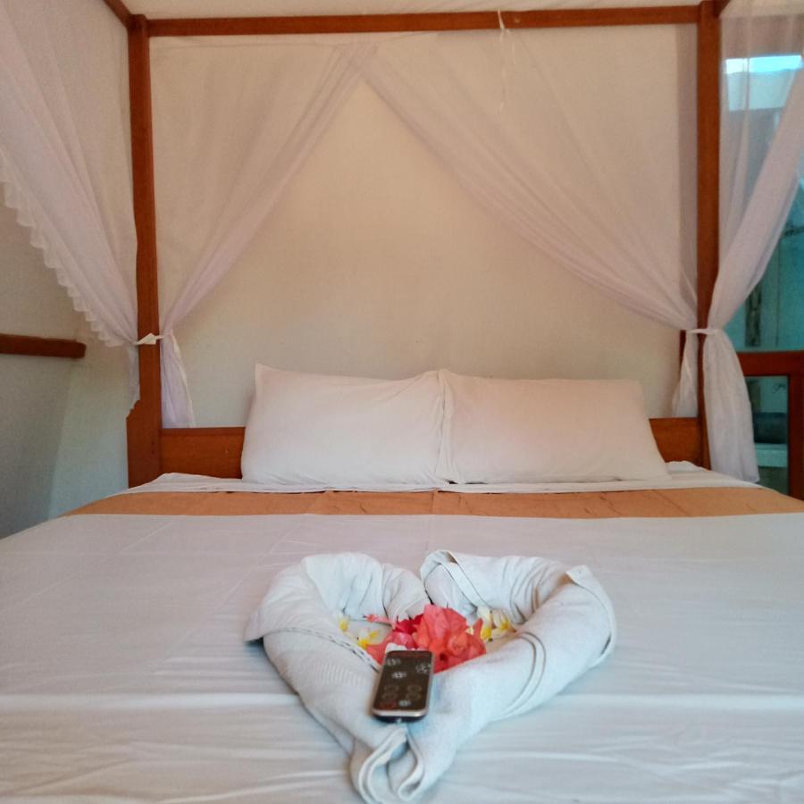 We'Be Cottages Ilhas Gili Exterior foto
