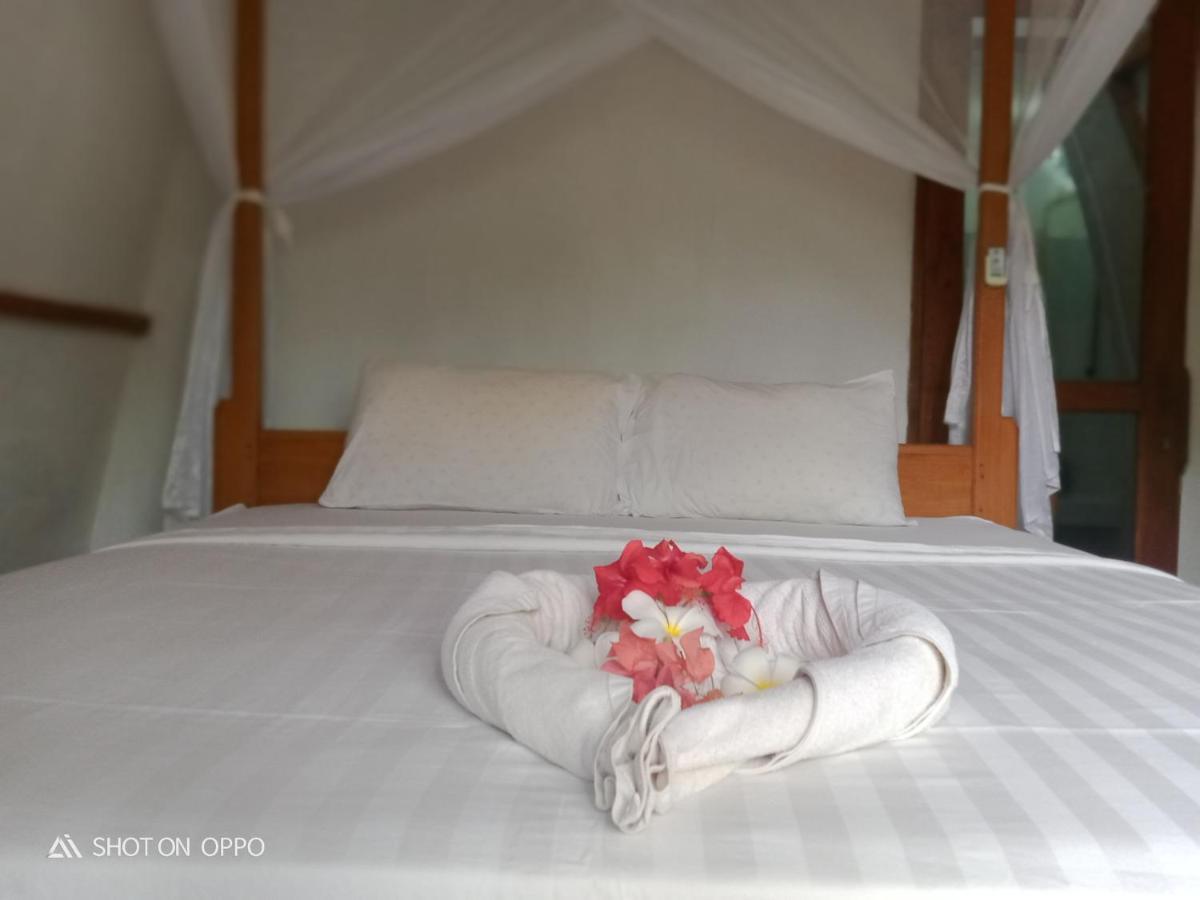We'Be Cottages Ilhas Gili Exterior foto