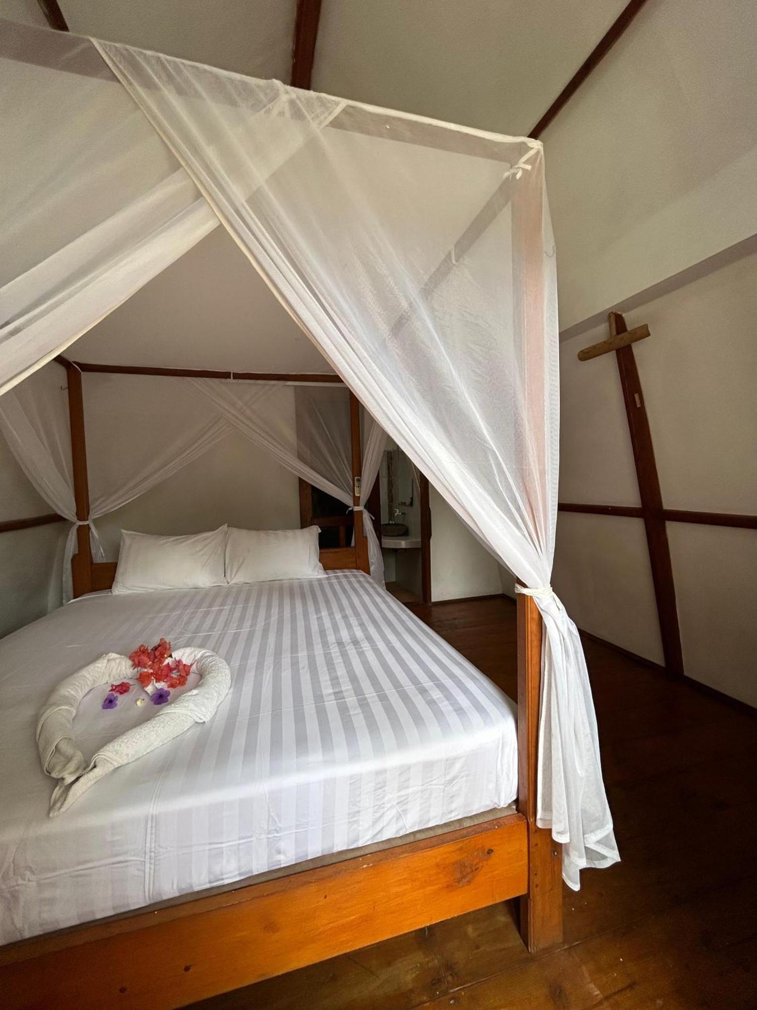 We'Be Cottages Ilhas Gili Exterior foto