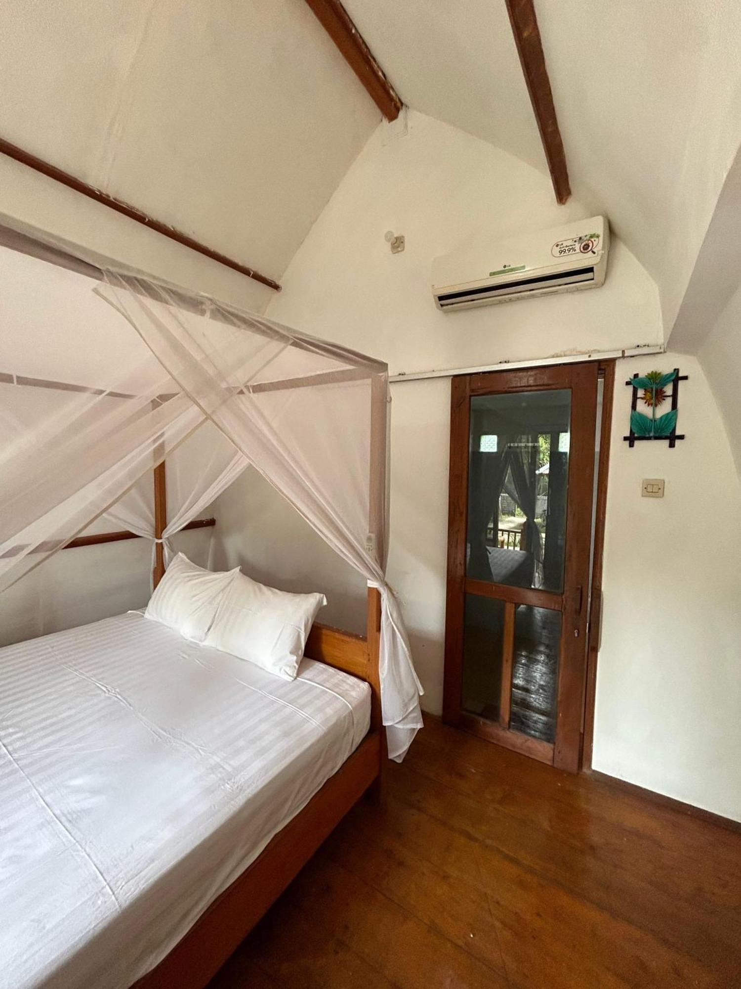 We'Be Cottages Ilhas Gili Quarto foto